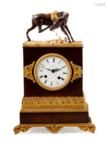 An Empire Style Gilt and Patinated Bronze Mantel Clock