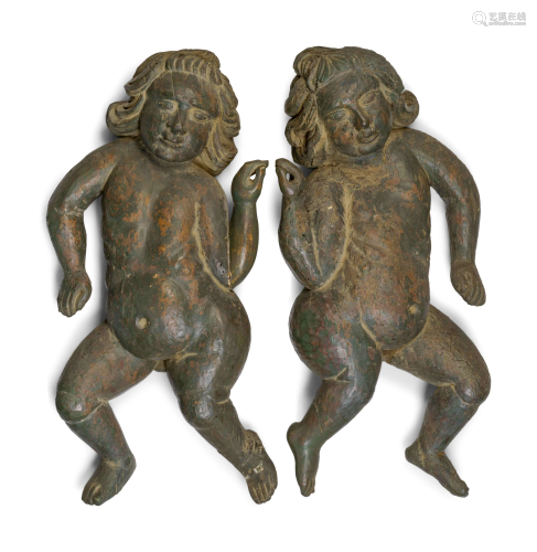 A Pair of Continental Carved and Painted Wood Putti