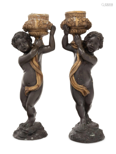 A Pair of Gilt and Patinated Bronze Cherubs