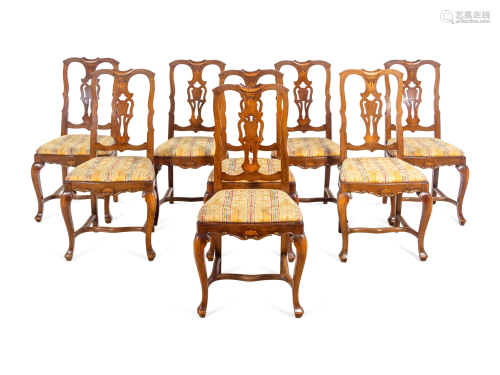 A Set of Eight French Walnut Dining Chairs