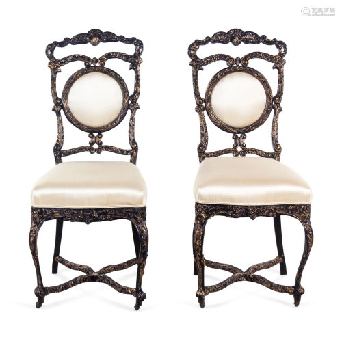 A Pair of Louis XV Style Ebonized and Gilded Side