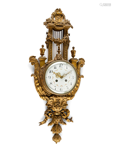 A Louis XVI Style Gilt Bronze Cartel Clock