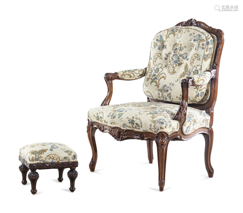 A Louis XV Style Carved Walnut Fauteuil