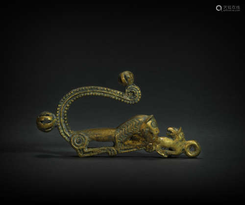 Copper and gilding belt hook in beast form from Han