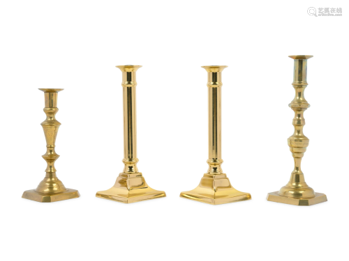 A Group of Brass Candlesticks