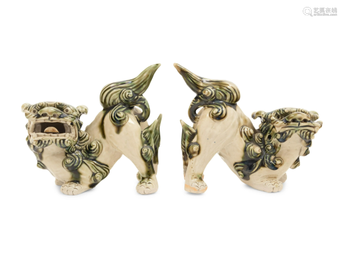 A Pair of Chinese Porcelain Guardian Lions