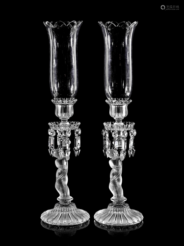 A Pair of Baccarat Glass Figural Candlesticks