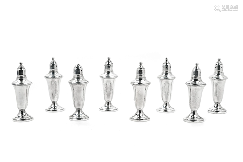 A Set of Eight American Silver Weighted Casters