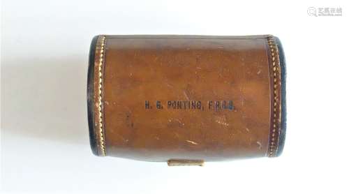 Herbert Ponting FRGS (1870-1935), a stitched brown leather c...