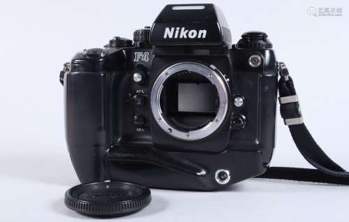 A Nikon F4 Camera Body, serial no 2258779, powers up, appear...