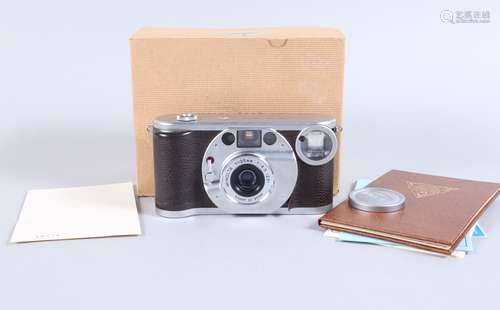 A Minolta Prod 20 s Camera, serial no 18571, powers up, shut...