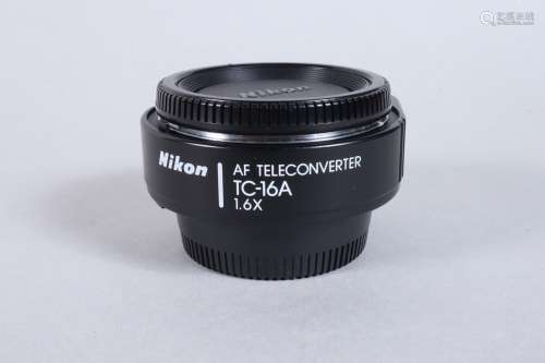 A Nikon TC 16A 1.6x AF Teleconverter, serial no 231957, body...