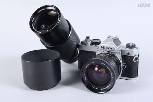 A Nikon FM SLR Camera, chrome, serial no 2440452, shutter wo...