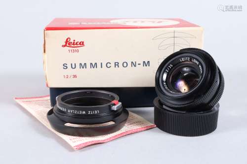 A Leica Summicron M 35mm f/2 Lens, black, made in Canada, se...
