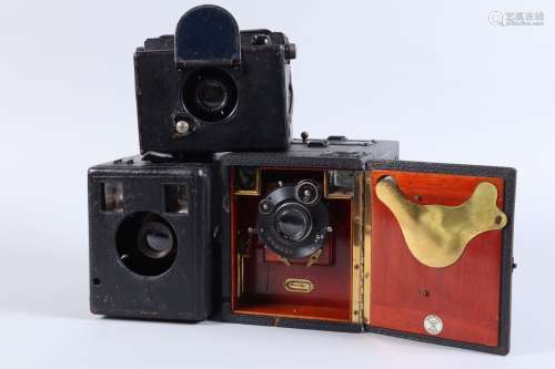 Three Early 20th Century British Cameras, comprising a Butch...