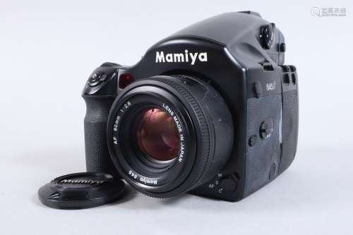 A Mamiya 645 AF Camera, serial no AC1399, shutter working, p...