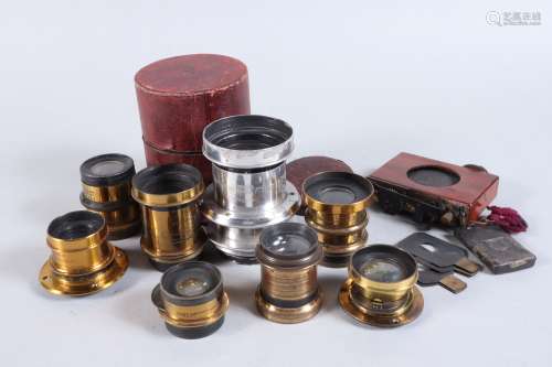 A Group of Small Brass Lenses, including a Busch Rapid Aplan...