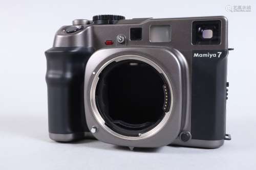A Mamiya 7 Camera Body, PB1161, powers up, LED display worki...