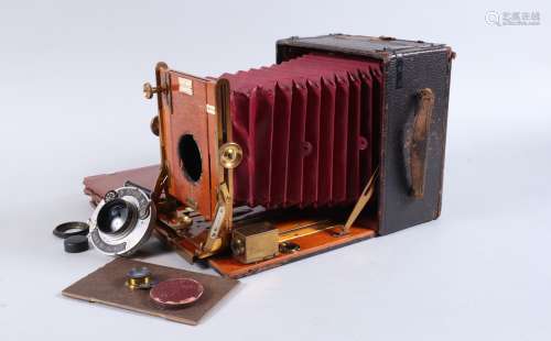 A Sanderson Regular Hand and Stand Camera, half plate, made ...