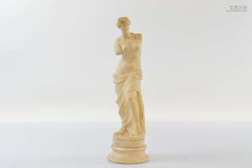 A late Grand Tour alabaster carving of Venus de Milo, on a s...