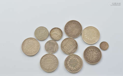 Ten 19th and 20th Century circulated silver French coins, in...
