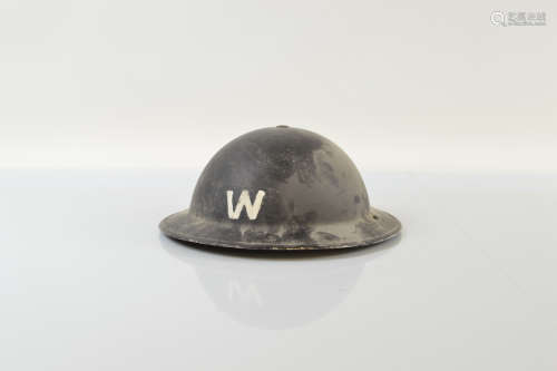 A WWII black painted Wardens helmet, with head piece and chi...