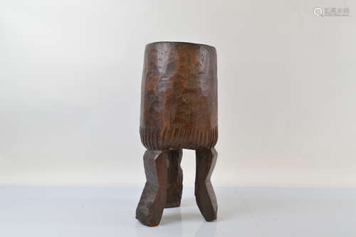 A carved African food mixing vessel, with one figural leg, 5...