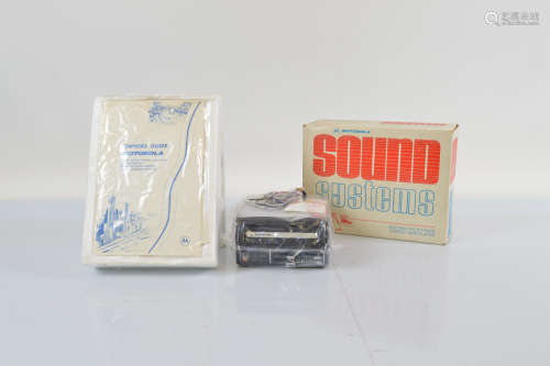 A boxed Motorola Sound Systems Automotive eight track stereo...
