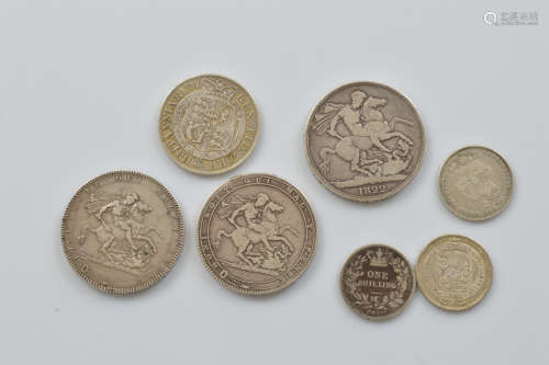 A collection of seven Georgian circulated silver coins, incl...