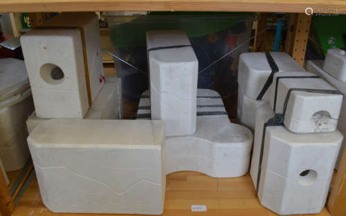 A good collection of plaster doll molds, various sizes and l...
