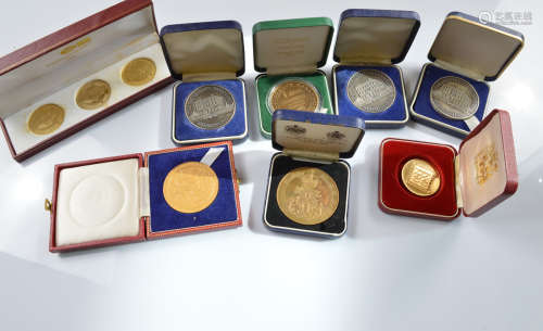 A collection of commemorative cased medallions, of local Mid...