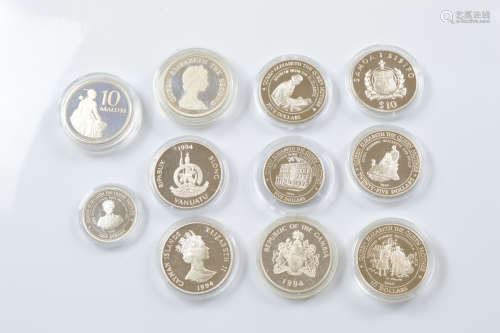 A set of eleven commemorative Elizabeth II Commonwealth coin...