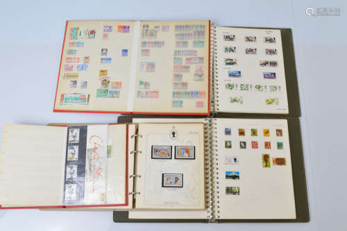 A collection of British and Commonwealth stamp albums, from ...