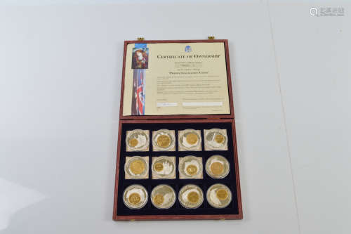 A collection of twelve pre decimal commemorative coins, each...