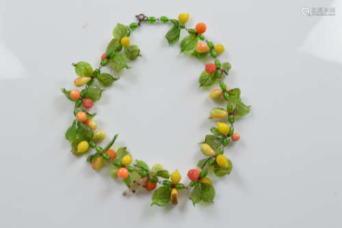 A vintage continental glass tutti frutti necklace, with styl...