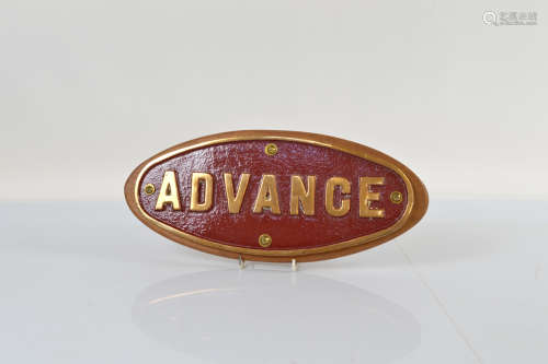 A brass and enamel oval lorry plate, mounted on mahogany sta...