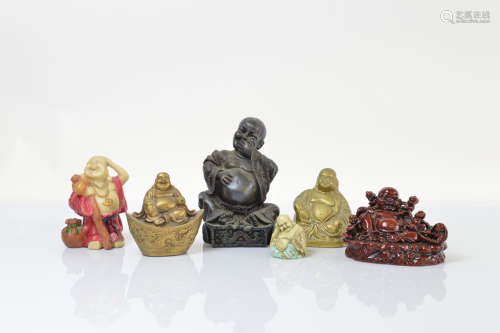 Six models all depicting the laughing/happy Buddha, in brass...
