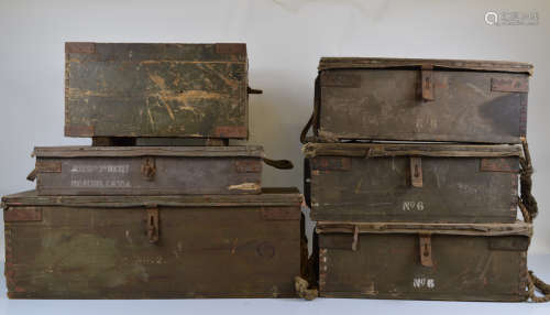 A collection of six various military hinged wooden and metal...