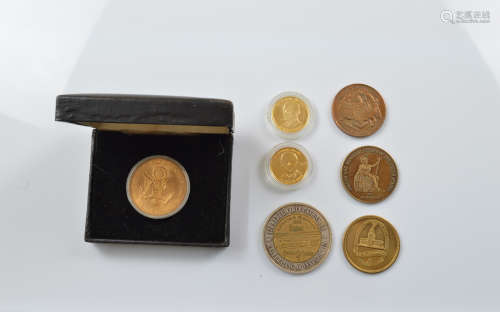 A small collection of commemorative American medallions, inc...