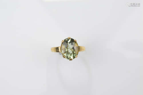 A certificated 9ct gold green amethyst dress ring, oval cut ...