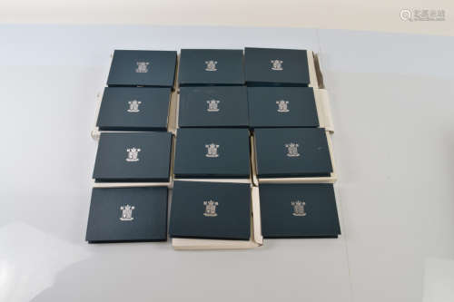 A collection of United Kingdom proof coin collection sets fr...