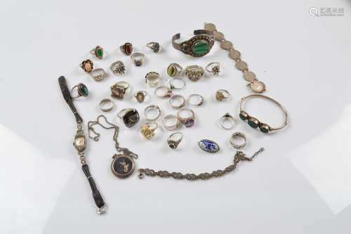 A collection of silver jewellery, including paste set rings,...