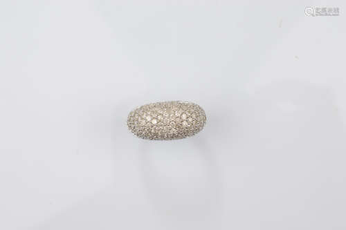 A certificated 9ct gold diamond dress ring, the bombe shaped...