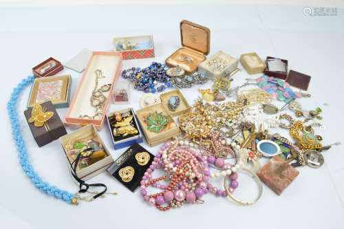 A collection of costume jewels, including a tiger's eye pend...