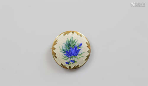 A silver and enamel floral circular brooch, with blue iris d...