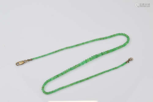 A certificated Zambian emerald necklace, the graduated facet...