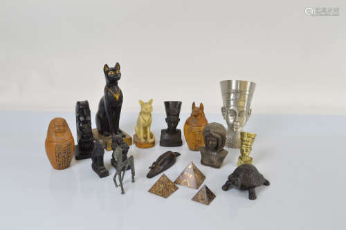 A collection of Egyptian style ornaments, including a pair o...