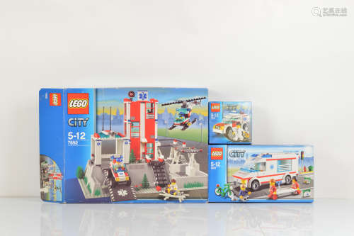 Three boxed Lego City models, including Hospital 7892 opened...