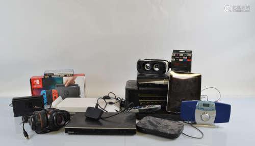 A large collection of assorted electrics, including Nintendo...