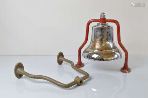 A 1950s chromed fire bell, with painted brass mountings (mis...
